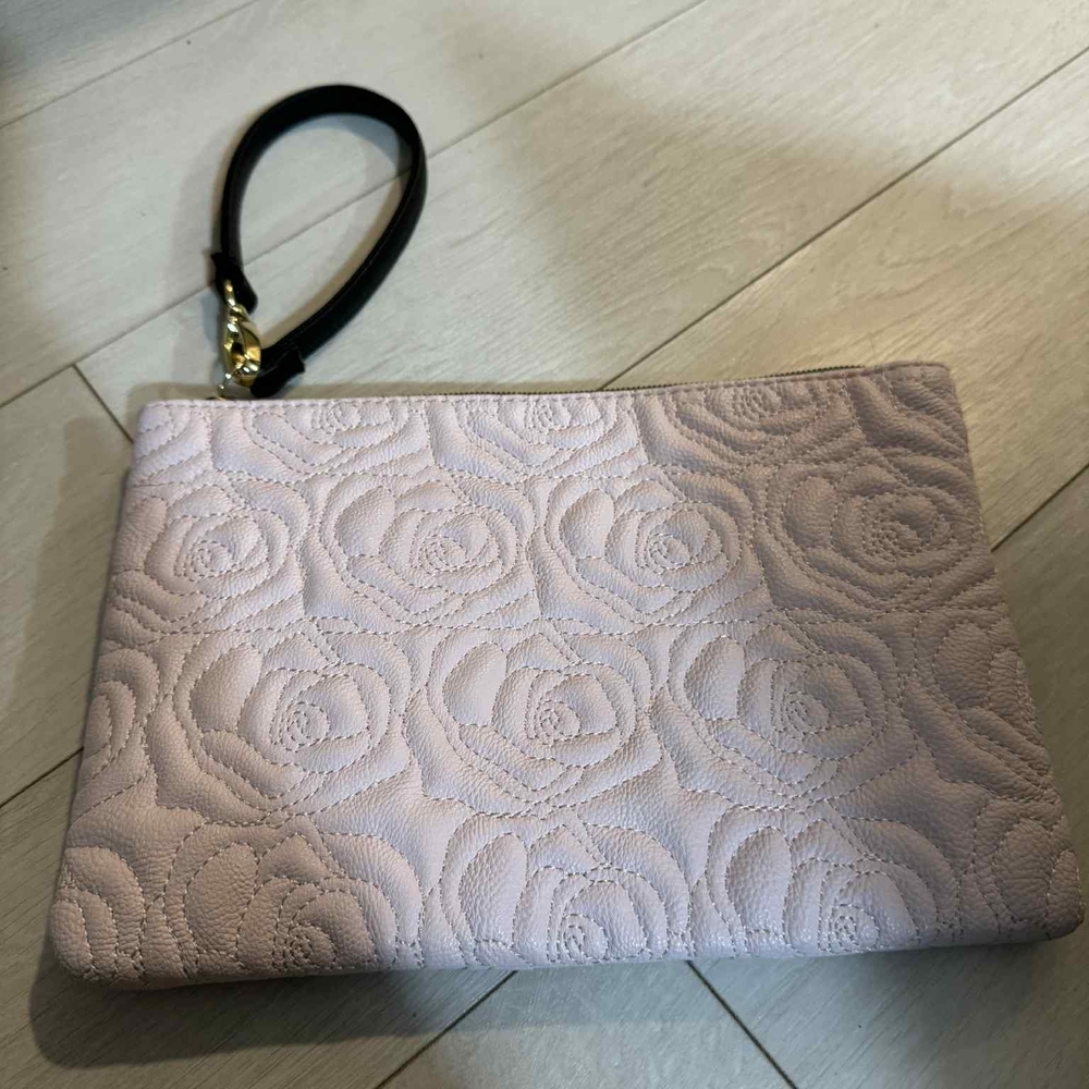 Elegant Pink Floral Embossed Clutch